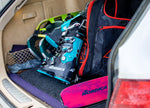 Pair of Nordica Promachine 95 W 2021 ski boots in a car