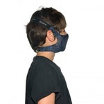 Side profile image of a kid wearing a Buff Filter Kids' Mask in Kasai Night Blue