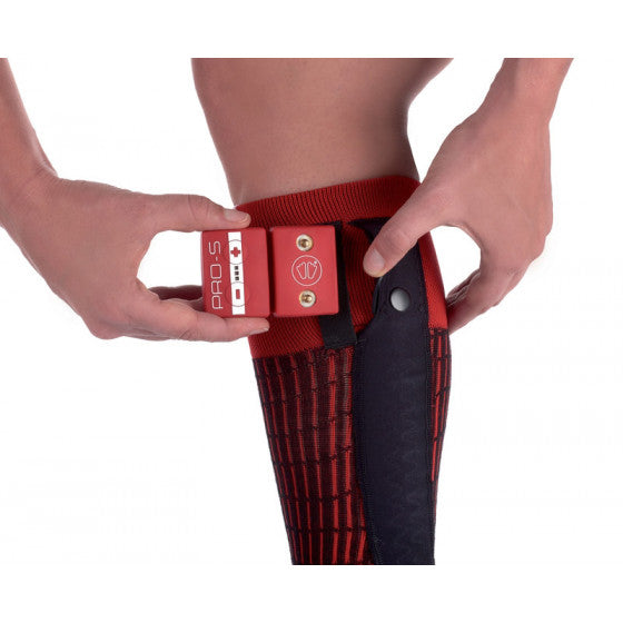 A person Inserting a battery into the Ski Heat LV Socks from Sidas